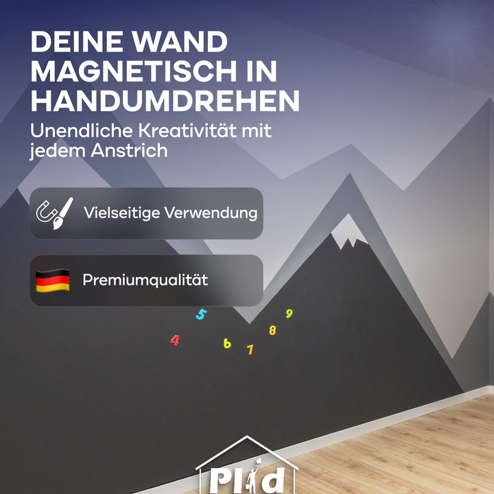 Eine Wand mit einem Bergmotiv und bunten Zahlen, gemalt mit plid Magnetfarbe - haftstark &amp; überstreichbar für viele Oberflächen. Der deutsche Text und das Flaggensymbol empfehlen die Verwendung als Memoboard. Schafft einen magnetischen, hellen, kreativen Raum.